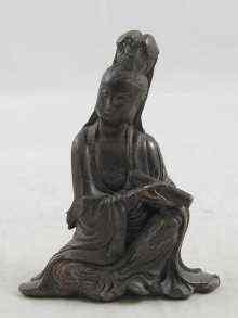 Appraisal: A bronze figure of Guanyin cm high