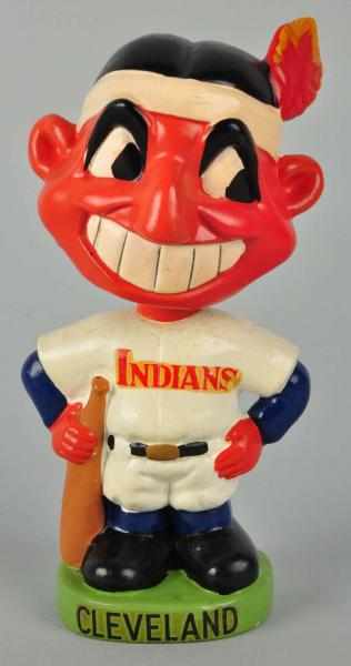 Appraisal: Cleveland Indian Mascot Bobbing Head Doll Description Green round base