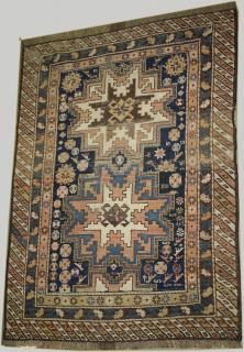 Appraisal: late th c Kazak medallion area rug areas of uneven