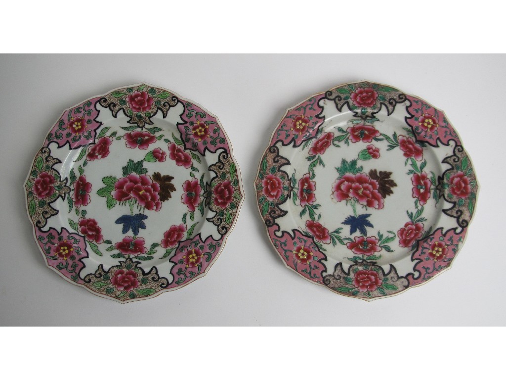 Appraisal: A pair of Chinese famille rose foliate moulded plates painted