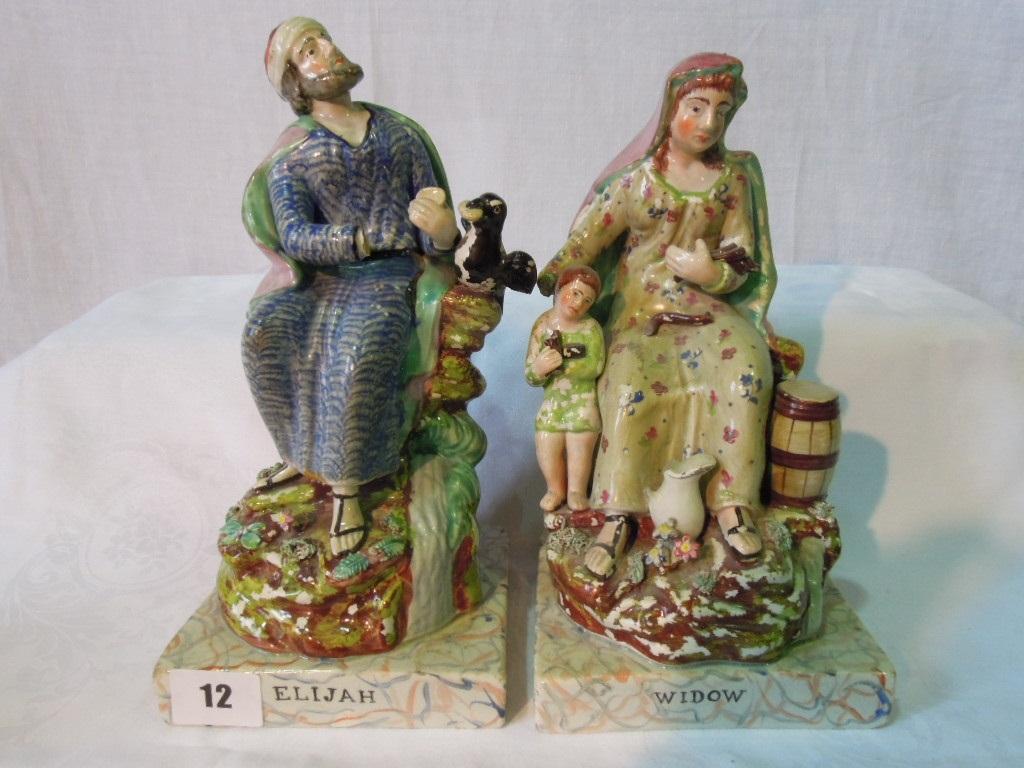 Appraisal: A pair of early th century Staffordshire figures of Elijah