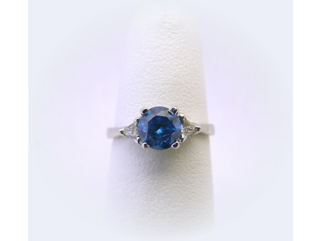 Appraisal: ct round blue diamond with trillion cut accent diamonds K