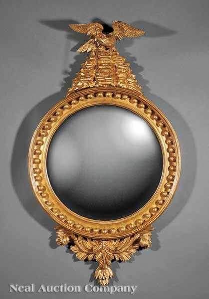 Appraisal: An American or English Giltwood Bullseye Mirror th c surmounted