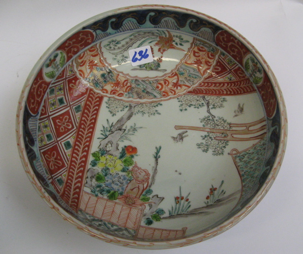 Appraisal: A JAPANESE IMARI PORCELAIN BOWL hand painted with cartouches of