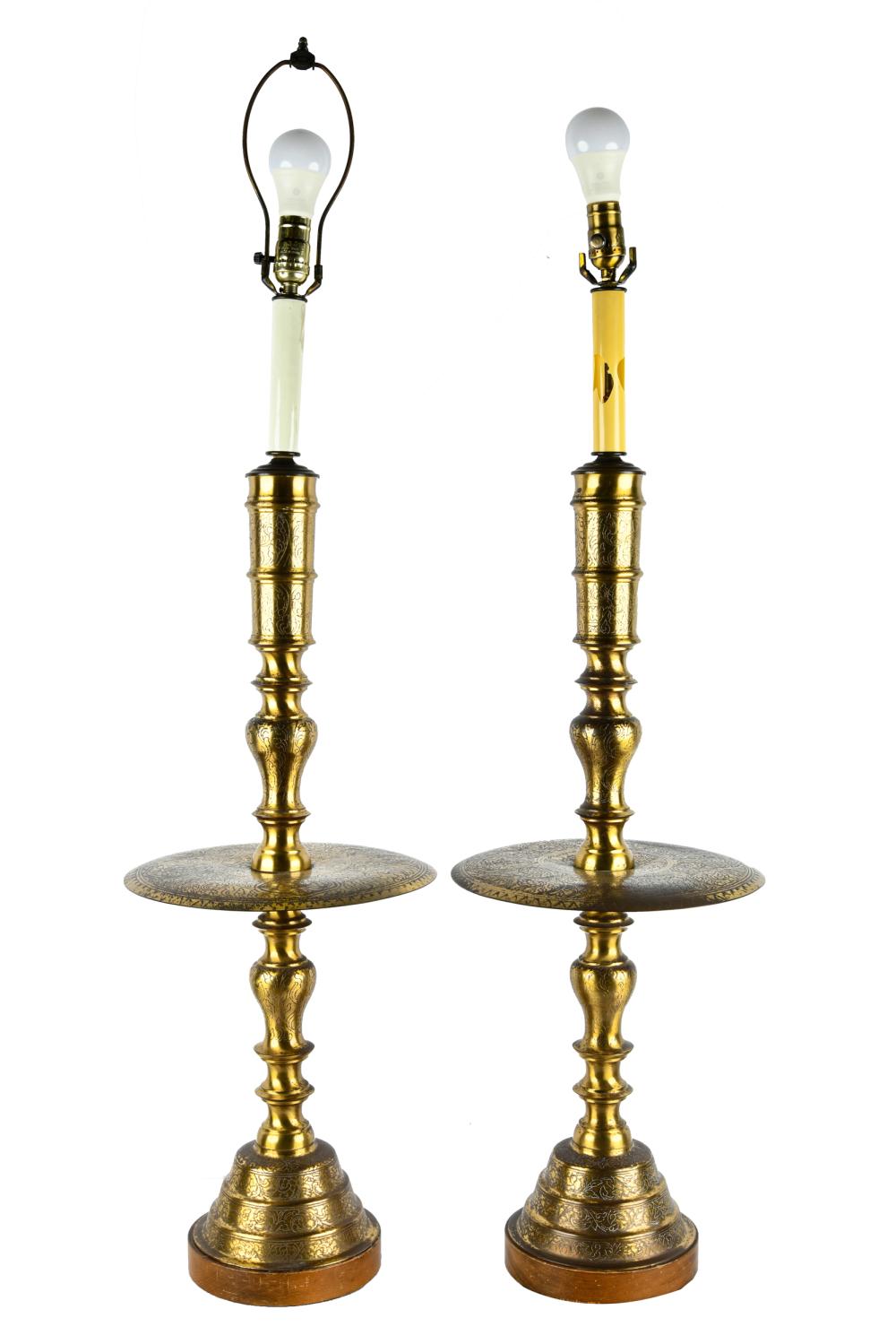 Appraisal: PAIR OF PERSIAN BRASS CANDLESTICKSmounted and wired as table lamps