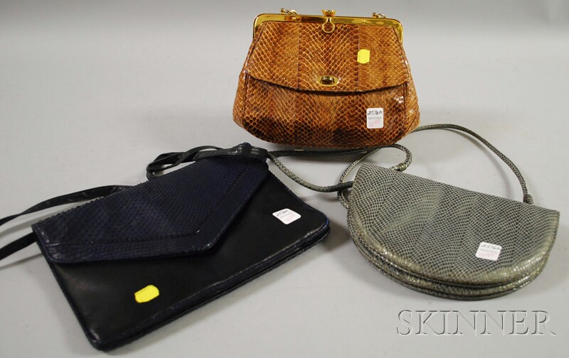 Appraisal: Three Vintage Snakeskin Purses including a navy blue envelope-style bag