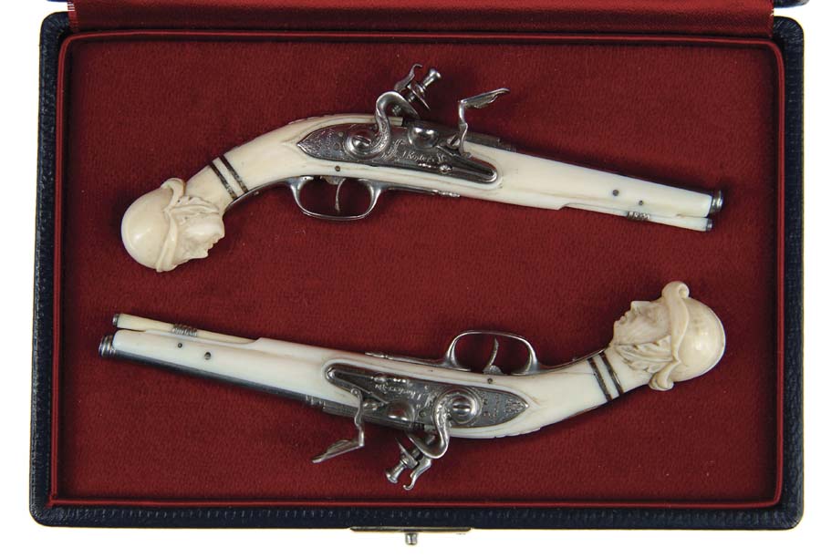 Appraisal: EXQUISITE PARE OF IVORY STOCKED MINIATURE DUTCH FLINTLOCK PISTOLS Extremely