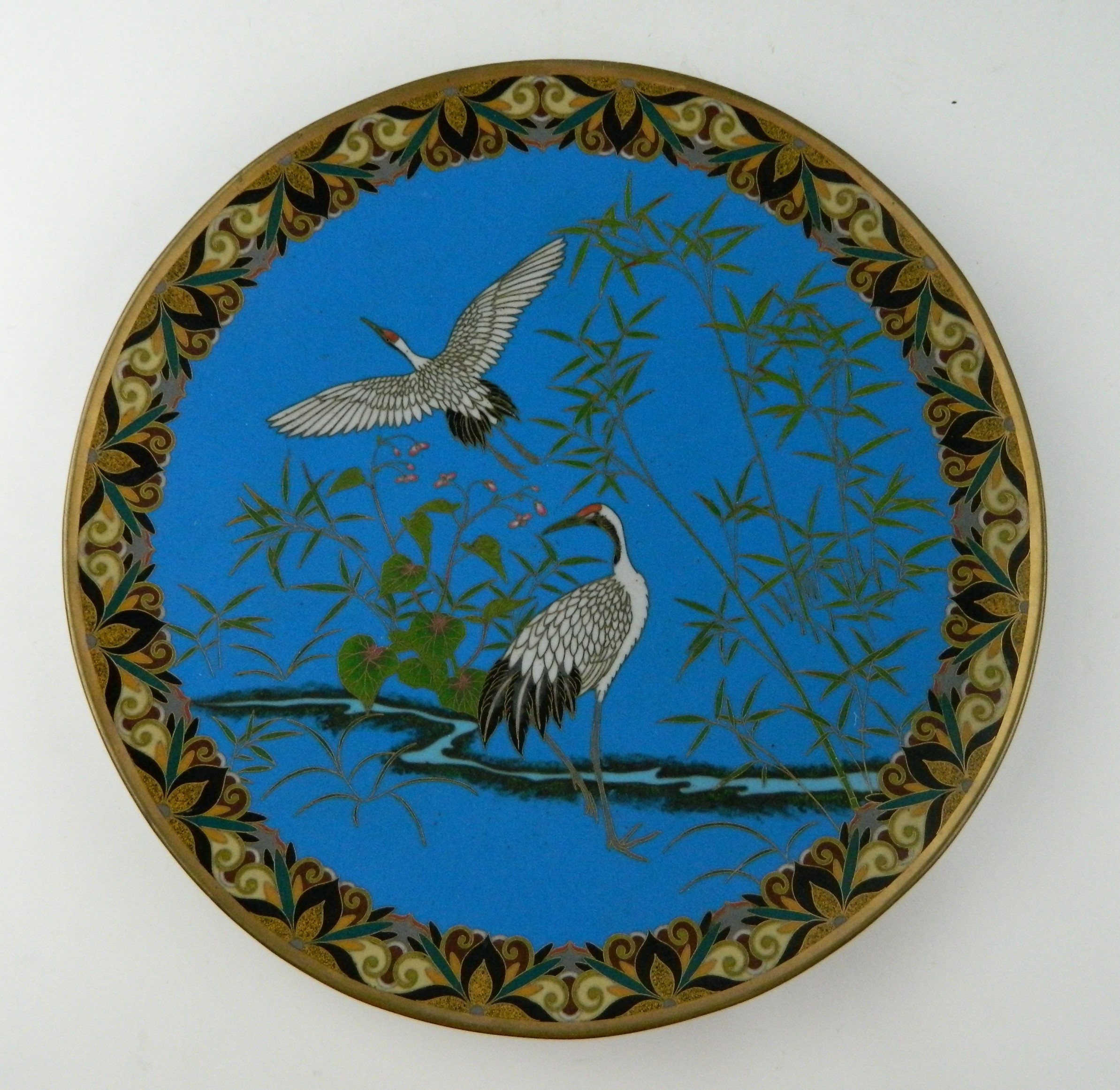 Appraisal: Japanese cloisonne plate- two crane motif on blue ground ''