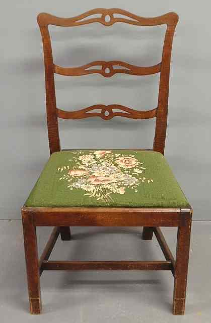 Appraisal: Pennsylvania tiger walnut ribbon-back side chair c with a needlepoint