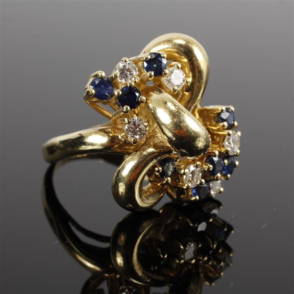 Appraisal: Yellow gold k Diamond Sapphire Retro Knot Estate Ring dwt