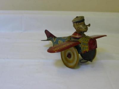 Appraisal: A Louis Marx Popeye the Pilot tin plate plane with