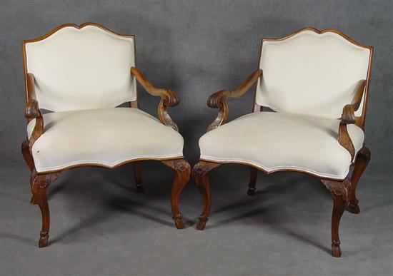 Appraisal: Pair of Historic Revival Armchairs Circa Having carved cabriole legs