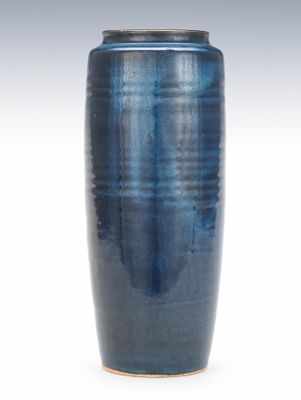 Appraisal: A Monochrome Blue Pottery Vase Tall thickly potted cylinder vase