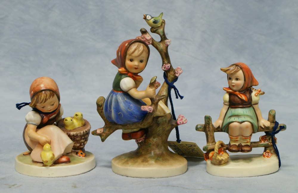 Appraisal: Hummel figurines Apple Tree Girl Hum Chick Girl Hum Just