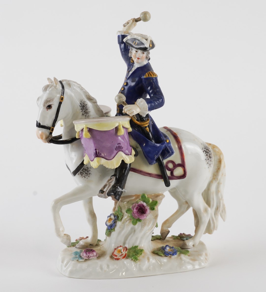 Appraisal: A MEISSEN FIGURE OF A SOLDIER DRUMMER ON HORSEBACK th