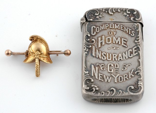 Appraisal: An antique fireman's brooch and vesta The ct fireman's hat