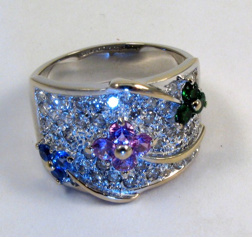 Appraisal: COLORED GEMSTONE AND DIAMOND RING k white gold and set