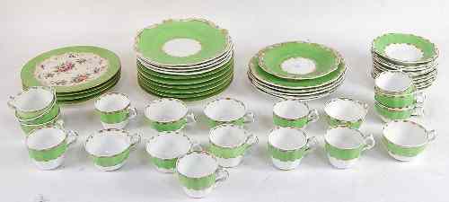 Appraisal: Ten th Century dessert plates decorated flowers within apple green