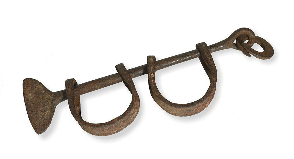 Appraisal: Pair of Middle Passage wrought iron slave shackles with a