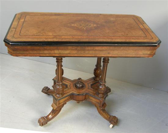 Appraisal: th century walnut line and marquetry inlaid card table on