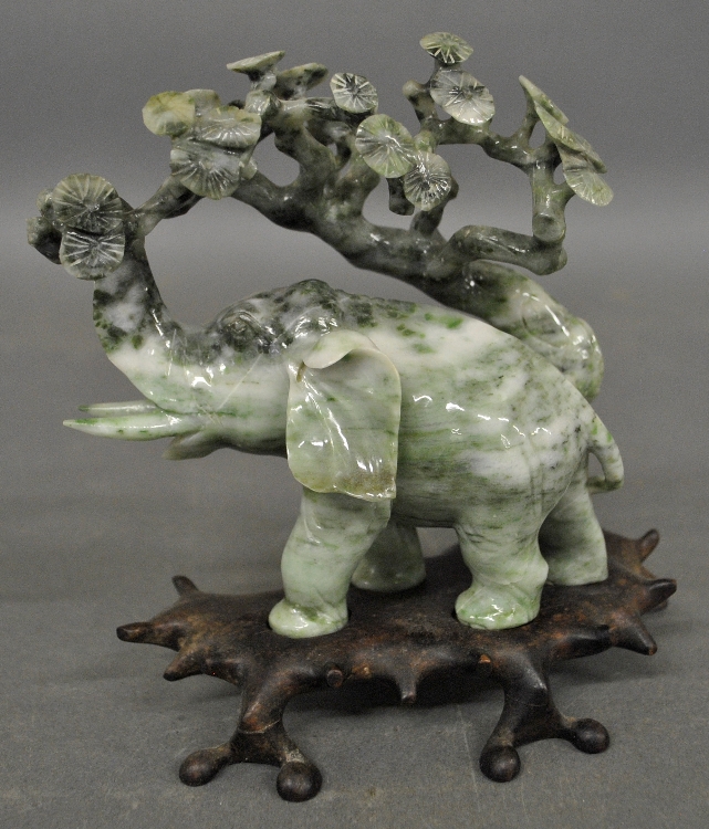 Appraisal: - Carved jade elephant and a cherry tree on a