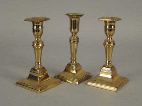 Appraisal: Pair of brass candlesticks th c with beaded bands h