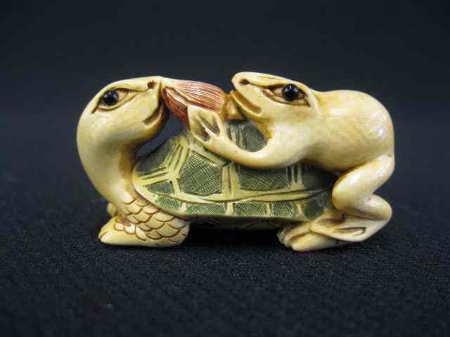 Appraisal: Carved Ivory Netsuke of a Turtle and Frog fancy polychrome