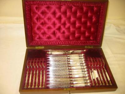 Appraisal: A SET OF TWELVE VICTORIAN DESSERT EATERS AND SERVERS with