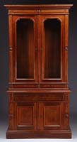 Appraisal: FINE TWO-PIECE WALNUT VICTORIAN SECRETARY BOOKCASE Top section having two