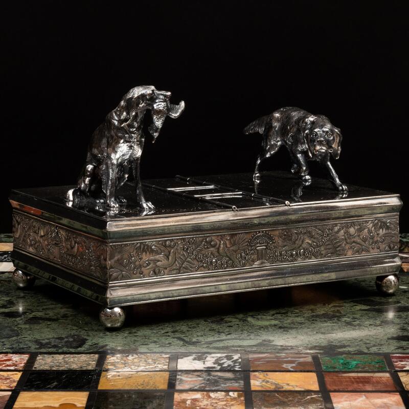 Appraisal: Silver Plate Smoking Box Mounted with Sporting Dogs Unmarked x