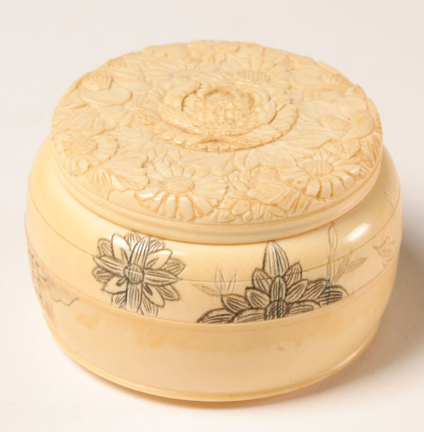 Appraisal: Japanese carved ivory round box chrysanthemum decoration dia The elephant