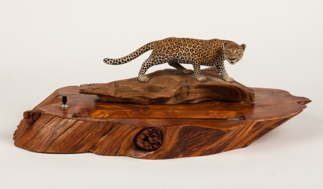 Appraisal: Carved wood leopard by Oliver Lawson dated modeled as a