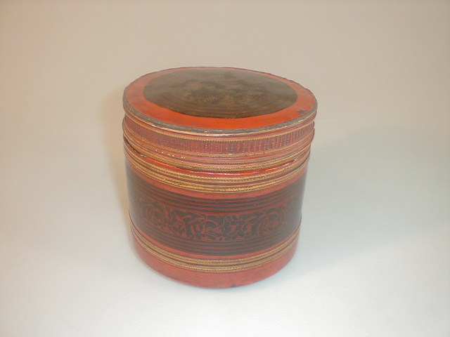 Appraisal: A Chinese red lacquer papier mache circular box with a