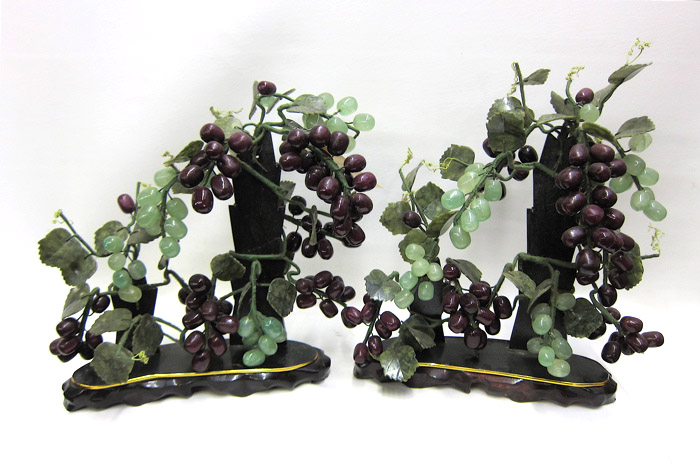 Appraisal: TWO CHINESE HARDSTONE FRUITING JADE TREES having a bounty of