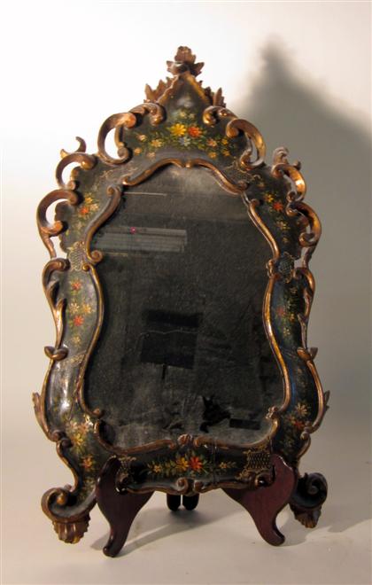 Appraisal: Continental ebonized and painted wall mirrorVenetian style The shaped plate