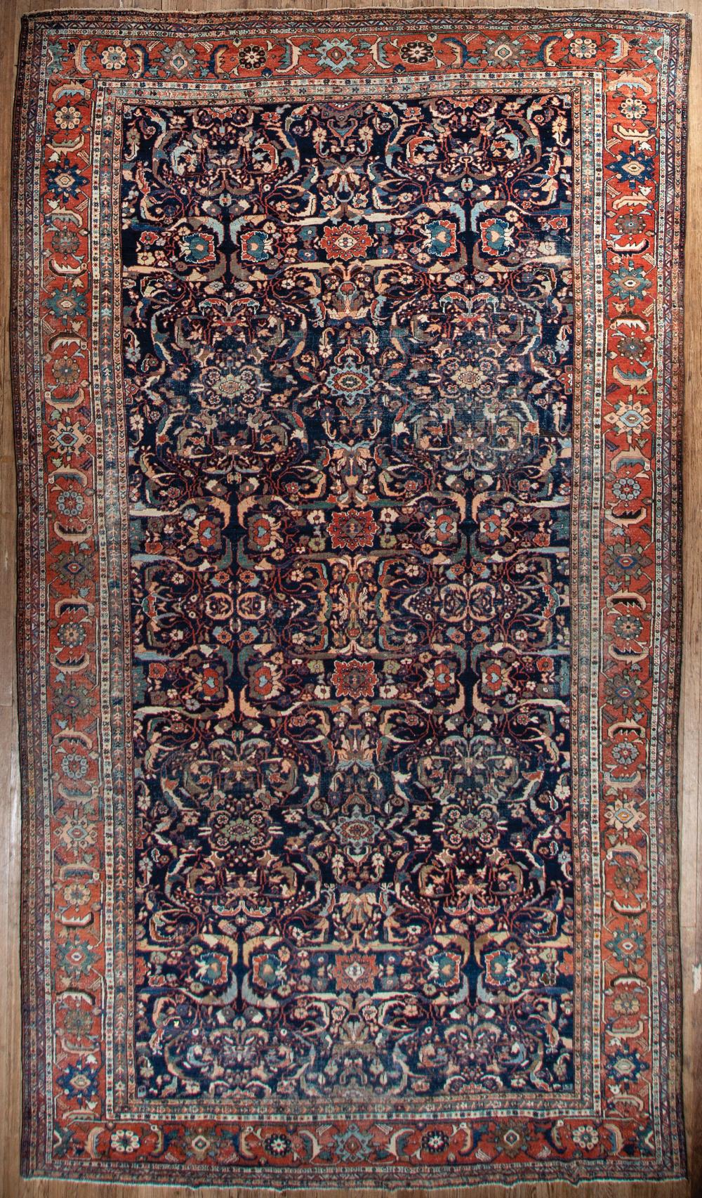 Appraisal: Large Antique Persian Carpet blue ground red border overall stylized