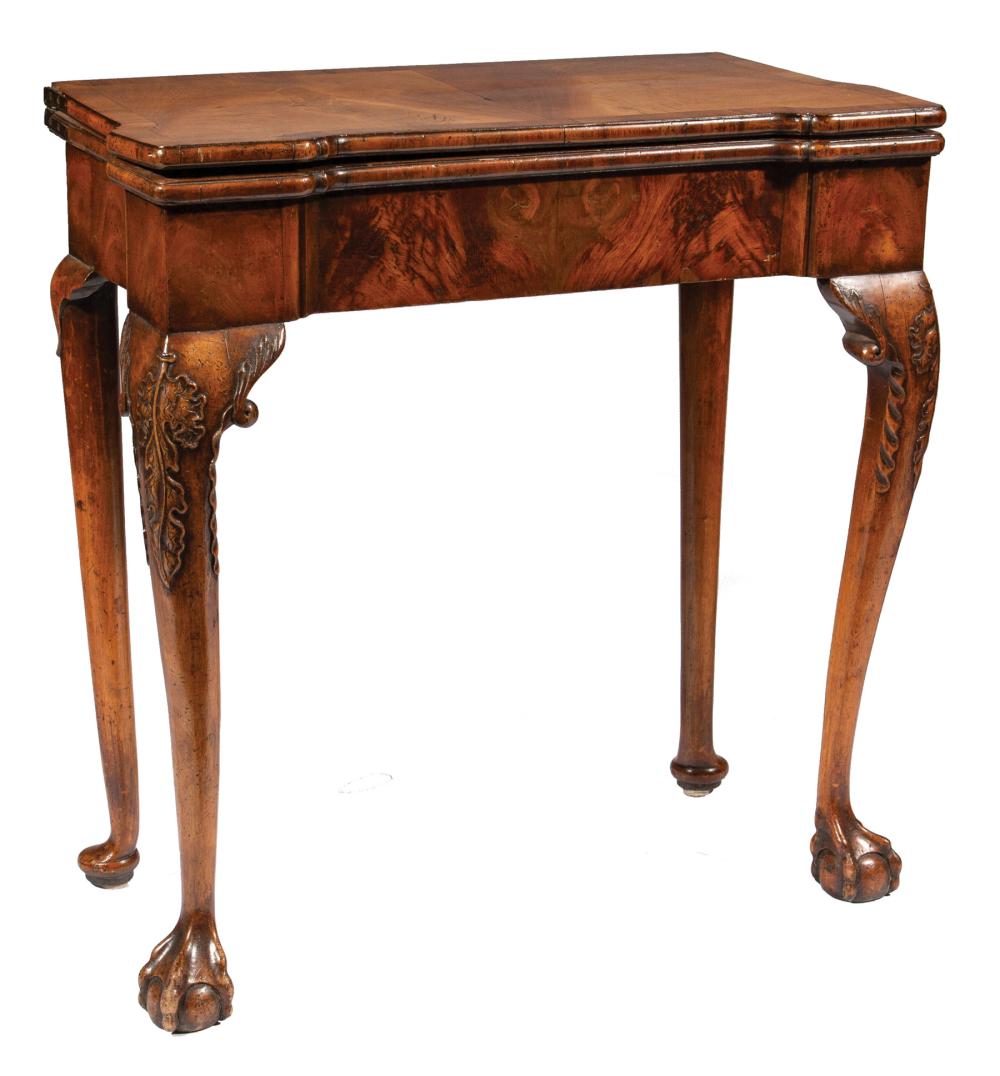 Appraisal: George II Carved Walnut Games Table foldover shaped top with