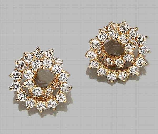 Appraisal: A pair of diamond and k gold clip-earrings estimated total