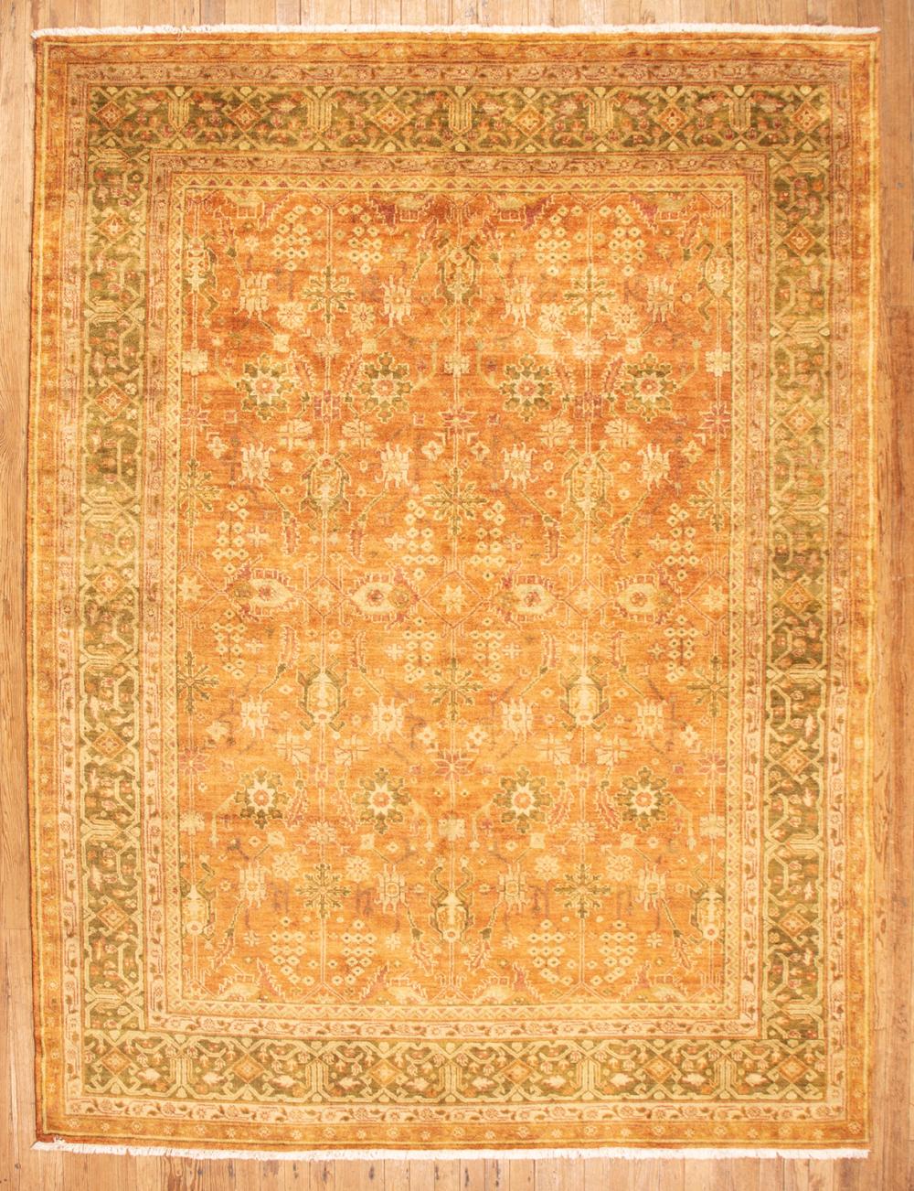 Appraisal: Oushak Carpet rust and green ground stylized foliate design ft