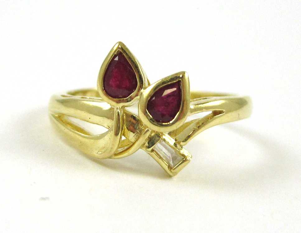 Appraisal: RUBY DIAMOND AND FOURTEEN KARAT GOLD RING set with one