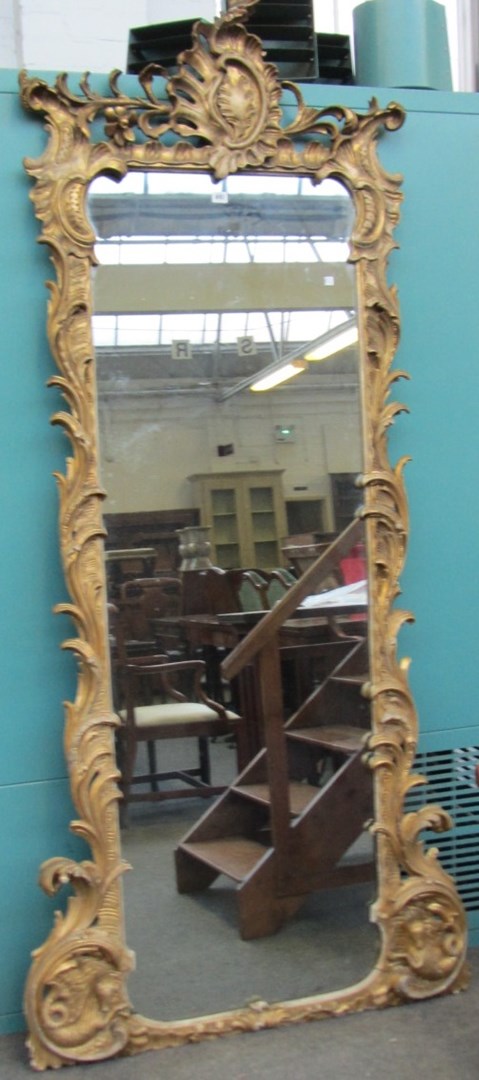 Appraisal: A large North European th century giltwood mirror with 'C'