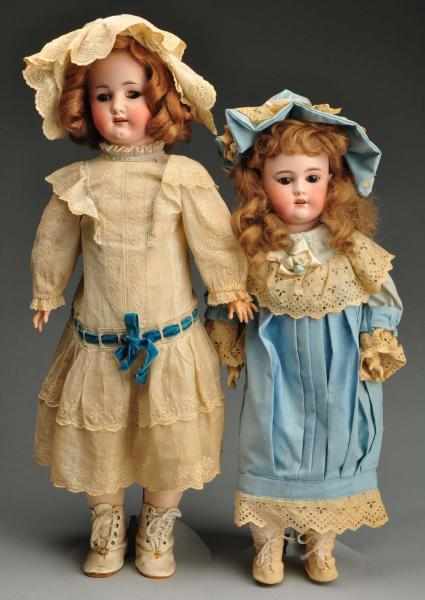 Appraisal: Lot of German Bisque Head Dolls Description Includes a larger