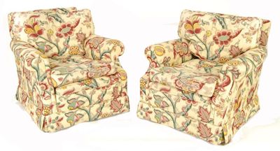 Appraisal: A pair of armchairs upholstered in floral patterned fabric