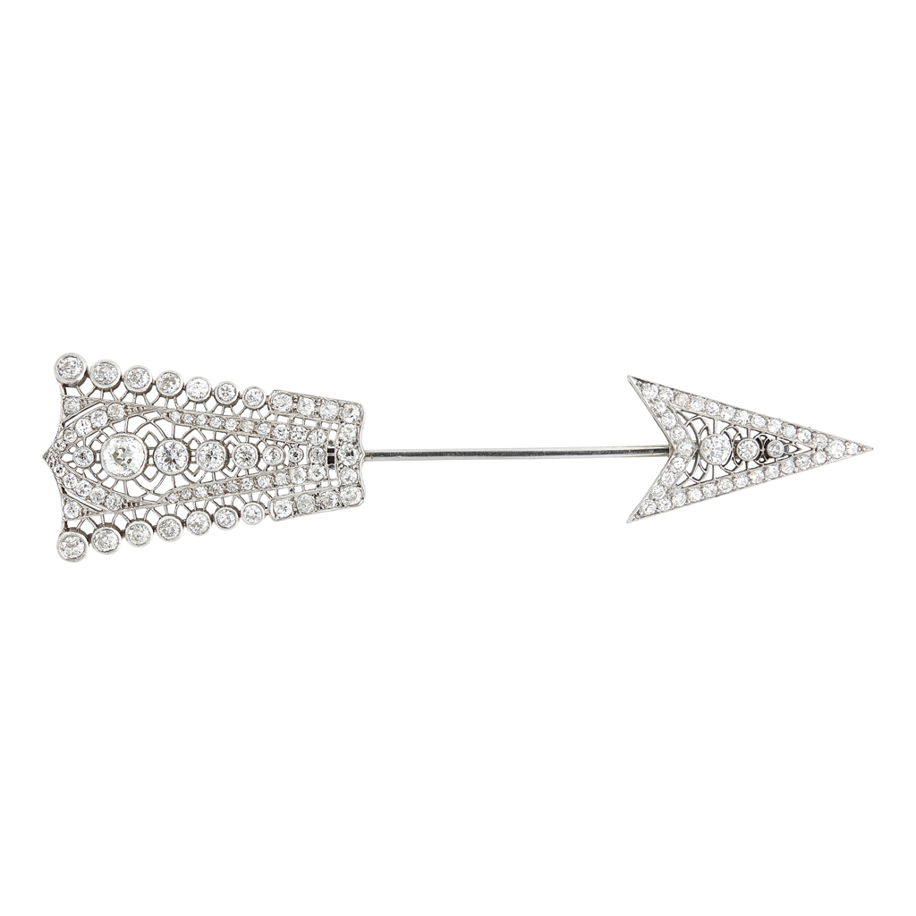 Appraisal: A diamond set jabot pin modelled as an arrow set