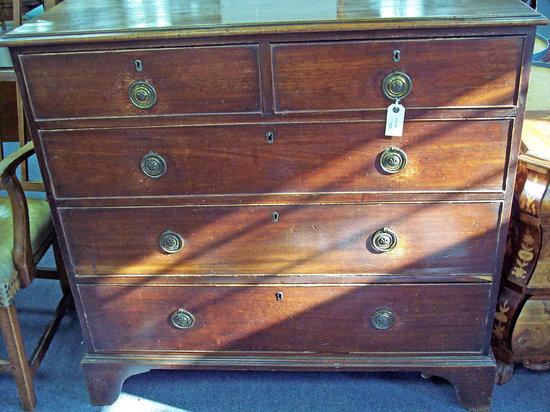 Appraisal: A late th Century mahogany chest of three long and