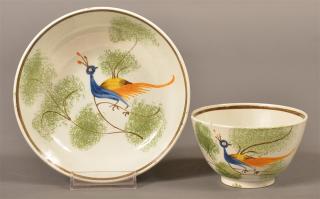 Appraisal: Leeds China Peafowl Decorated Cup and Saucer Leeds Soft Paste