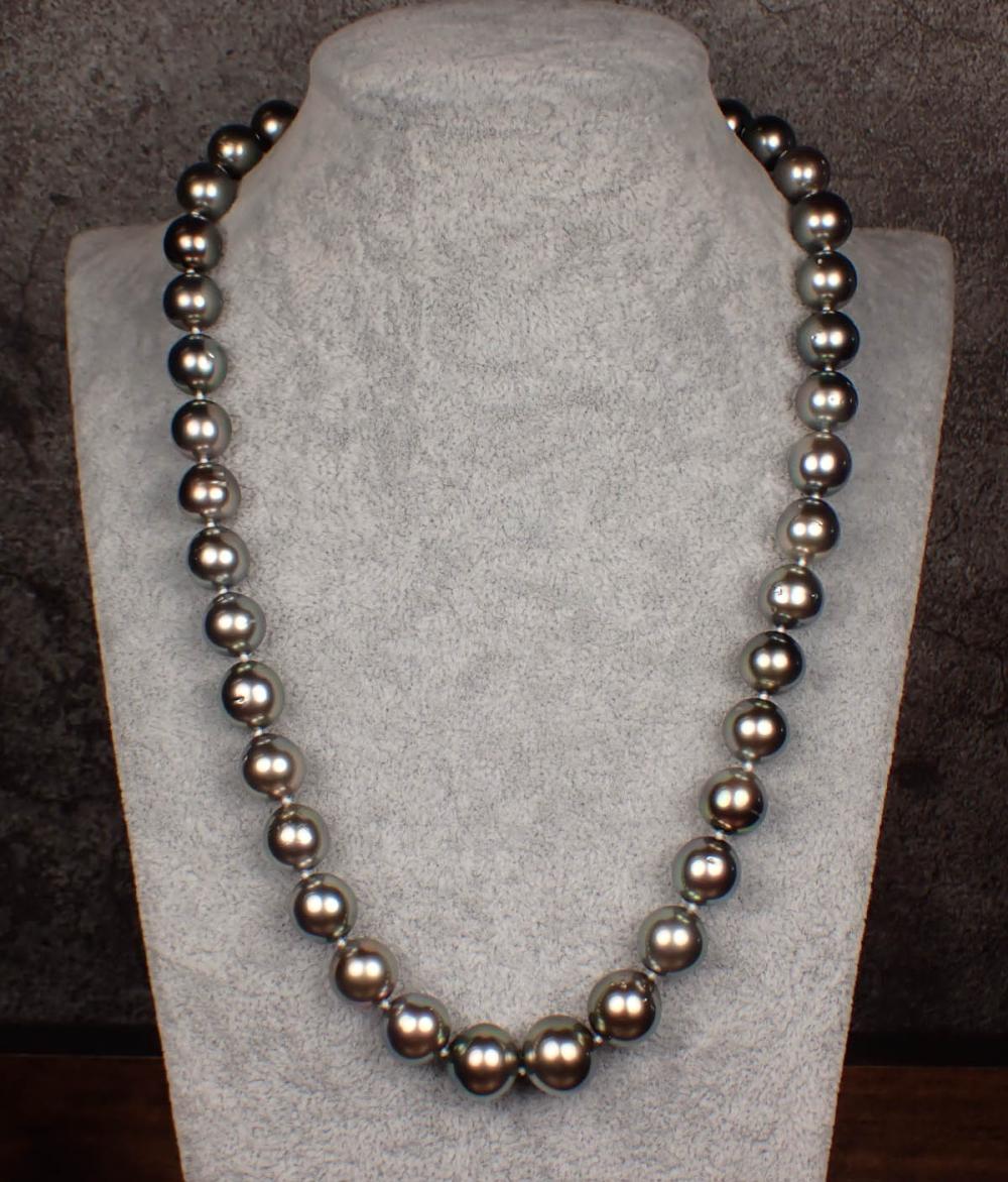 Appraisal: TAHITIAN PEARL AND FOURTEEN KARAT GOLD NECKLACE hand-knotted strand of