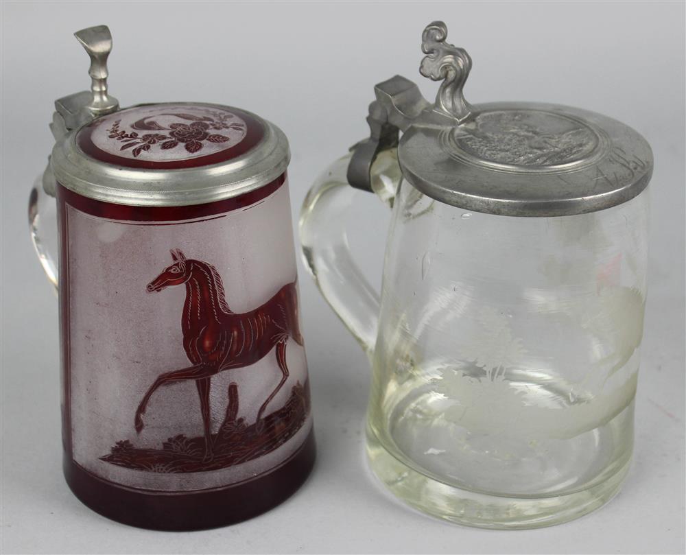 Appraisal: TWO CONTINENTAL EQUINE THEMED PEWTER MOUNTED GLASS STEINS th Century