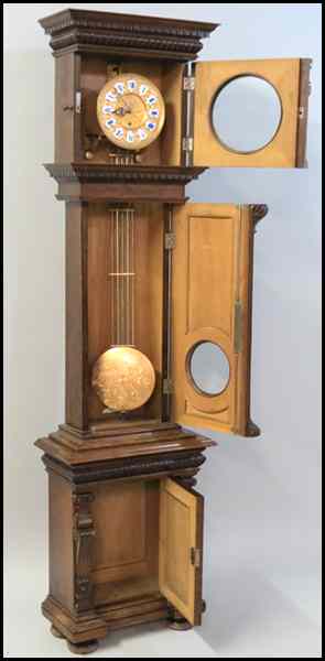 Appraisal: LENZ KIRCH WALNUT TALL CASE CLOCK With pendulum and one