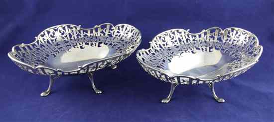 Appraisal: A pair of George V pierced silver fruit dishes of